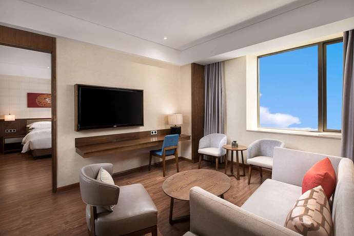 Imagen de la habitación del Hotel Ramada By Wyndham Baoji Jintai. Foto 7