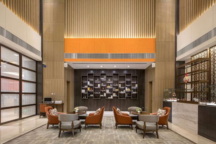 Imagen de los interiores del Hotel Ramada By Wyndham Baoji Jintai. Foto 8