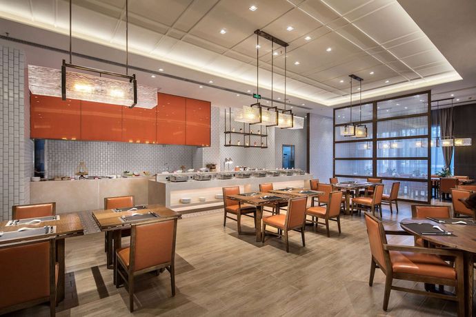 Imagen del bar/restaurante del Hotel Ramada By Wyndham Baoji Jintai. Foto 4