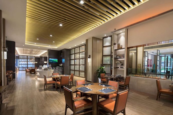 Imagen del bar/restaurante del Hotel Ramada By Wyndham Baoji Jintai. Foto 5