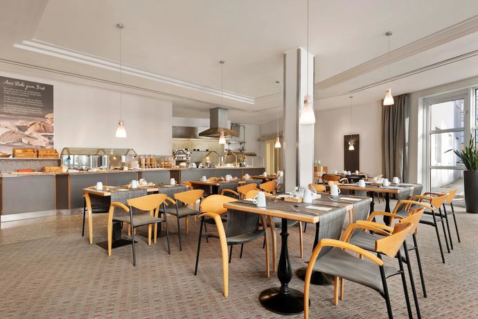 Imagen del bar/restaurante del Hotel Ramada By Wyndham Bottrop. Foto 6