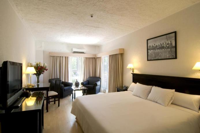 Imagen de la habitación del Hotel Ramada By Wyndham Buenos Aires Vicente Lopez. Foto 9