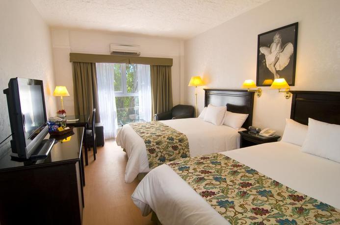 Imagen de la habitación del Hotel Ramada By Wyndham Buenos Aires Vicente Lopez. Foto 10