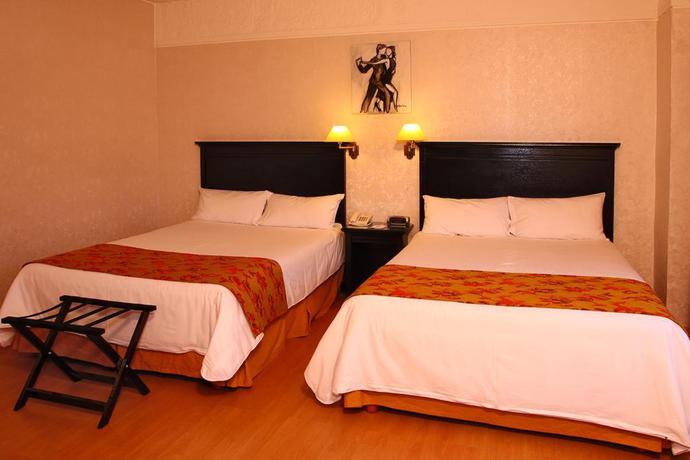 Imagen de la habitación del Hotel Ramada By Wyndham Buenos Aires Vicente Lopez. Foto 11