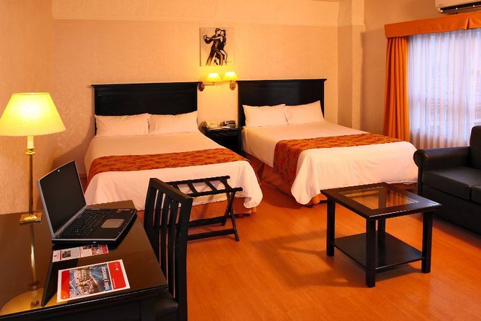 Imagen de la habitación del Hotel Ramada By Wyndham Buenos Aires Vicente Lopez. Foto 14