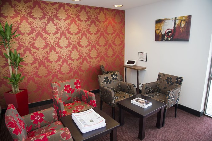 Imagen de los interiores del Hotel Ramada By Wyndham Cambridge. Foto 20