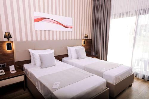 Imagen de la habitación del Hotel Ramada By Wyndham Cesme. Foto 2