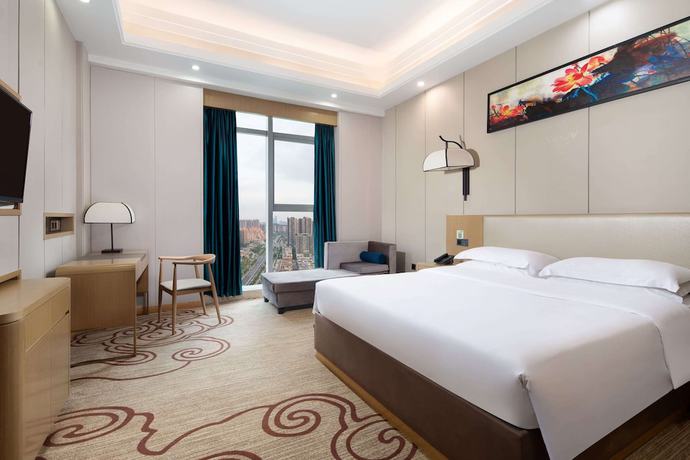 Imagen de la habitación del Hotel Ramada By Wyndham Changsha North. Foto 7