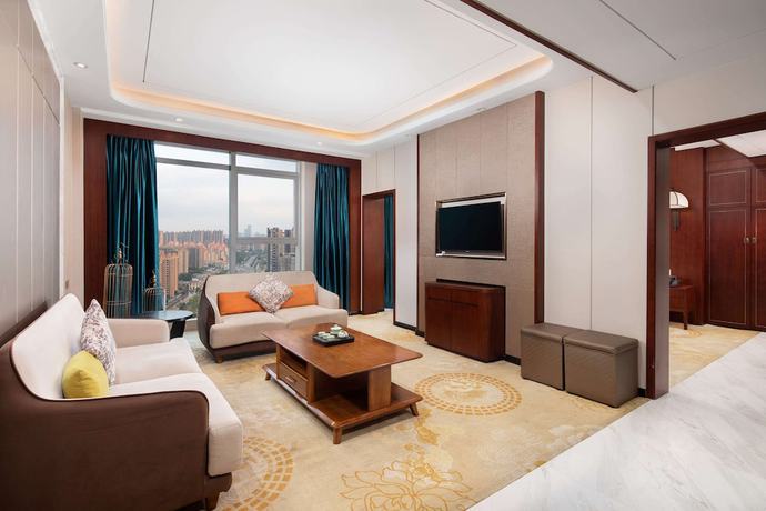 Imagen de la habitación del Hotel Ramada By Wyndham Changsha North. Foto 11