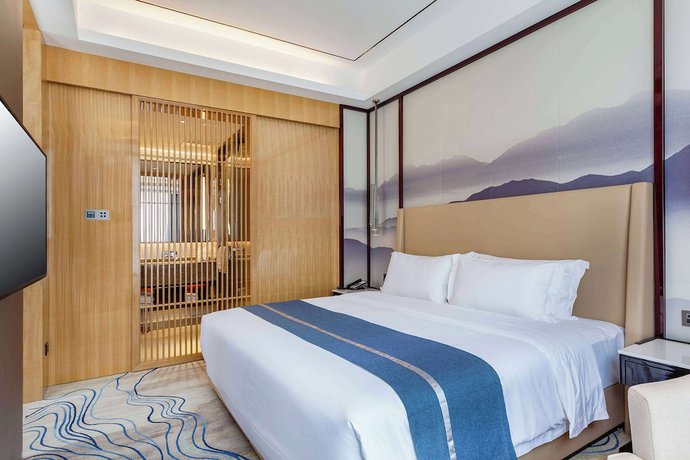 Imagen de la habitación del Hotel Ramada By Wyndham Changsha South Bus Station. Foto 2