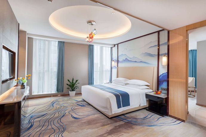 Imagen de la habitación del Hotel Ramada By Wyndham Changsha South Bus Station. Foto 3