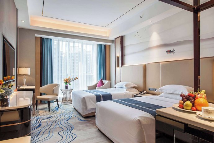 Imagen de la habitación del Hotel Ramada By Wyndham Changsha South Bus Station. Foto 7