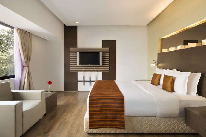 Imagen de la habitación del Hotel Ramada By Wyndham Chennai Egmore. Foto 6