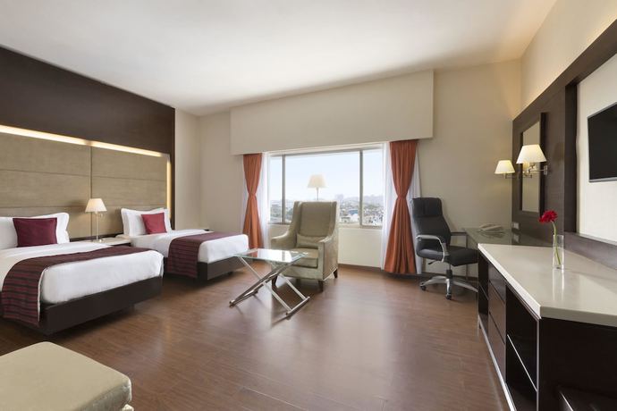 Imagen de la habitación del Hotel Ramada By Wyndham Chennai Egmore. Foto 11