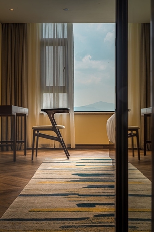 Imagen de la habitación del Hotel Ramada By Wyndham Chenzhou Dongjiang Lake. Foto 9