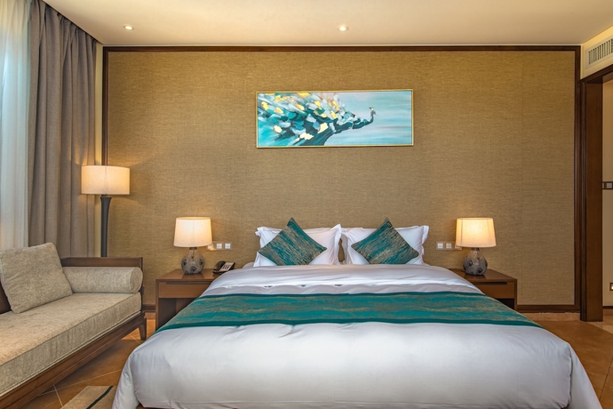 Imagen de la habitación del Hotel Ramada By Wyndham Chenzhou Dongjiang Lake. Foto 11