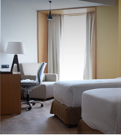 Imagen de la habitación del Hotel Ramada By Wyndham Dehradun Chakrata Road. Foto 10