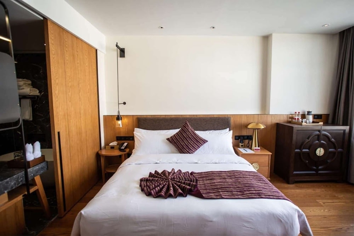 Imagen de la habitación del Hotel Ramada By Wyndham Diqing. Foto 4