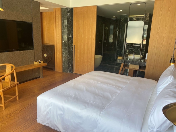 Imagen de la habitación del Hotel Ramada By Wyndham Diqing. Foto 6