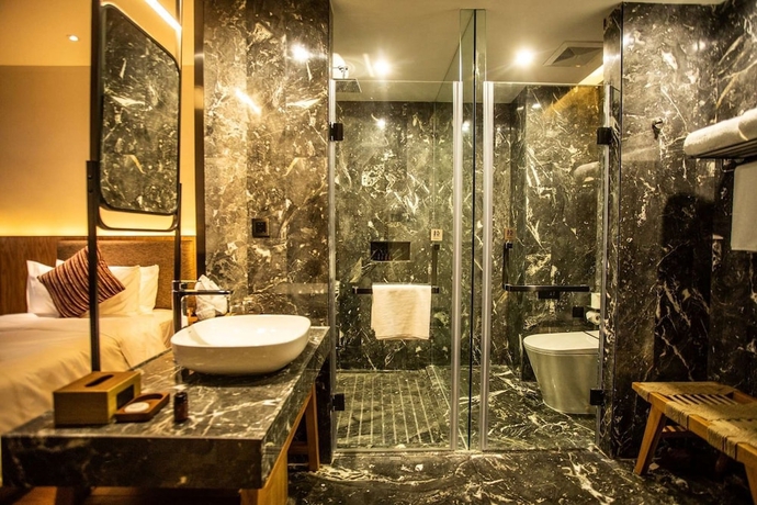 Imagen de la habitación del Hotel Ramada By Wyndham Diqing. Foto 7