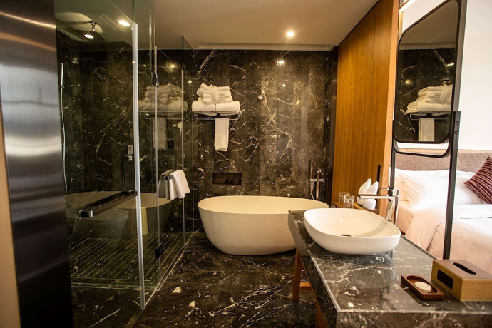 Imagen de la habitación del Hotel Ramada By Wyndham Diqing. Foto 8