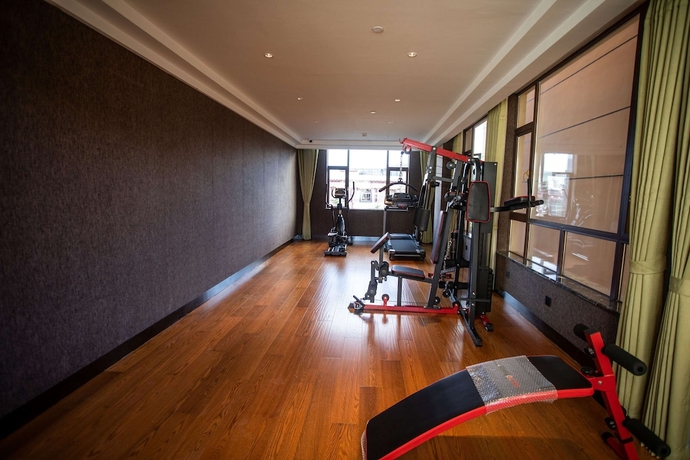 Imagen de los interiores del Hotel Ramada By Wyndham Diqing. Foto 10