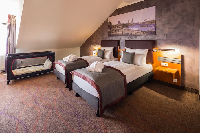 Imagen de la habitación del Hotel Ramada By Wyndham Dresden. Foto 6