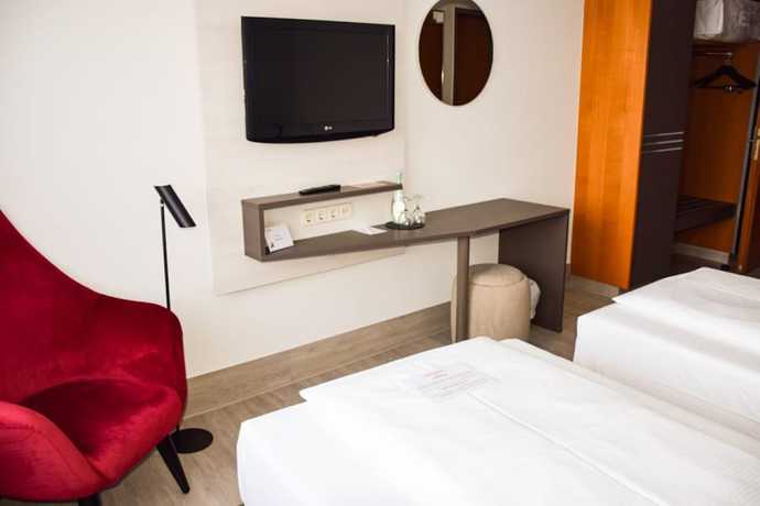 Imagen de la habitación del Hotel Ramada By Wyndham Dresden. Foto 8