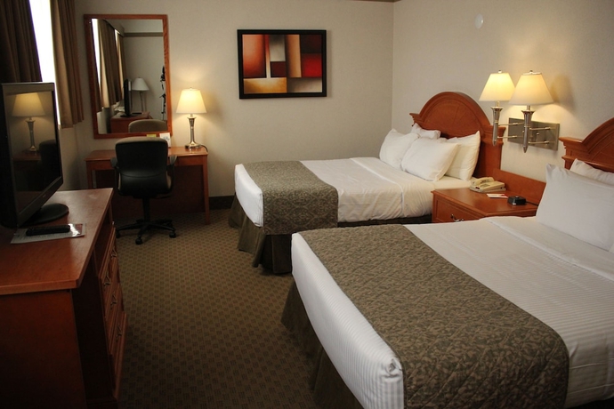 Imagen de la habitación del Hotel Ramada By Wyndham Edmonton South. Foto 2