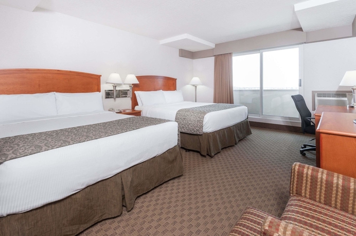 Imagen de la habitación del Hotel Ramada By Wyndham Edmonton South. Foto 4