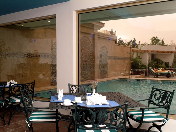 Imagen del bar/restaurante del Hotel Ramada By Wyndham Fes. Foto 4