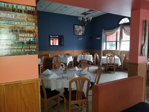 Imagen del bar/restaurante del Hotel Ramada By Wyndham Flemington. Foto 2