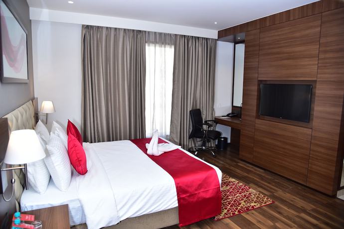 Imagen de la habitación del Hotel Ramada By Wyndham Gandhidham Shinay. Foto 1
