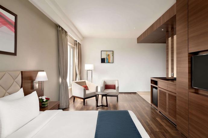 Imagen de la habitación del Hotel Ramada By Wyndham Gandhidham Shinay. Foto 4