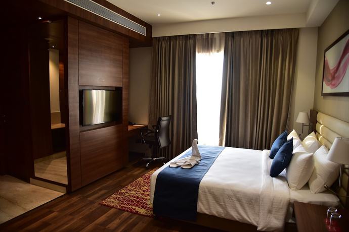 Imagen de la habitación del Hotel Ramada By Wyndham Gandhidham Shinay. Foto 13