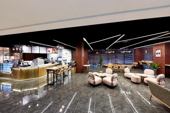 Imagen de los interiores del Hotel Ramada By Wyndham Gumi. Foto 20