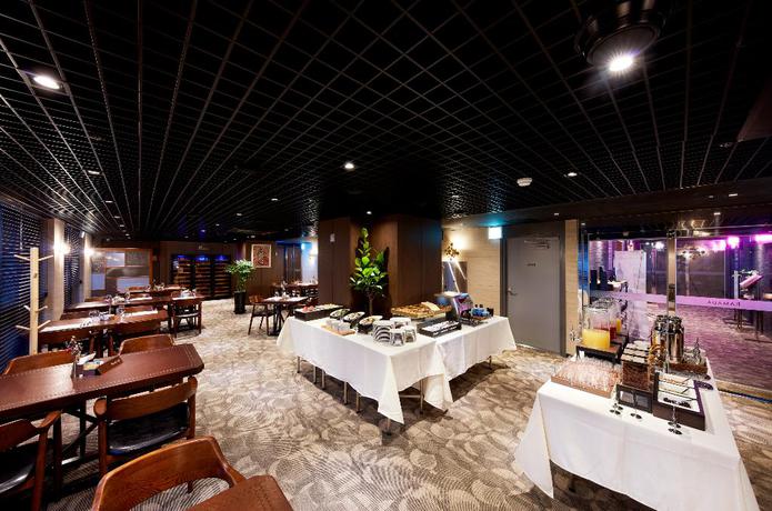 Imagen del bar/restaurante del Hotel Ramada By Wyndham Gumi. Foto 6
