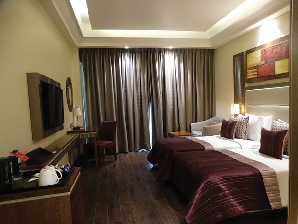Imagen de la habitación del Hotel Ramada By Wyndham Gurgaon Central. Foto 8