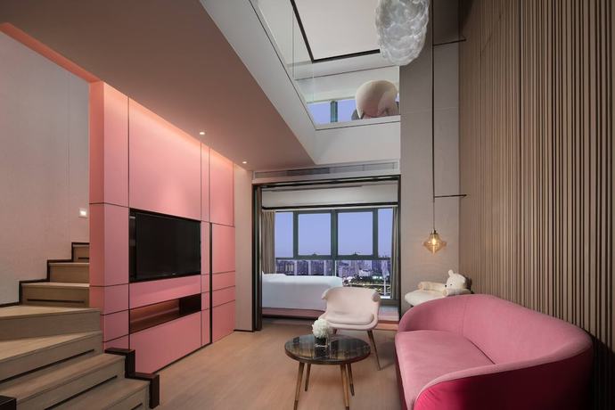 Imagen de la habitación del Hotel Ramada By Wyndham Hengyang Zhengxiang. Foto 14