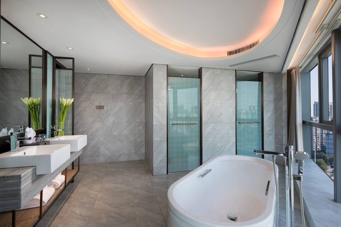 Imagen de la habitación del Hotel Ramada By Wyndham Hengyang Zhengxiang. Foto 17