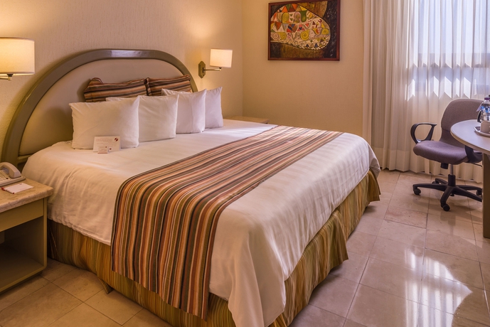 Imagen de la habitación del Hotel Ramada By Wyndham Hola Culiacan. Foto 7