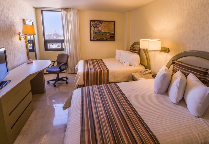 Imagen de la habitación del Hotel Ramada By Wyndham Hola Culiacan. Foto 10