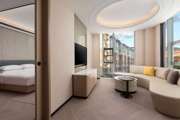 Imagen de la habitación del Hotel Ramada By Wyndham Honghe Kaiyuan. Foto 3