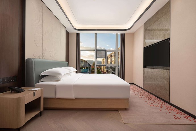 Imagen de la habitación del Hotel Ramada By Wyndham Honghe Kaiyuan. Foto 4