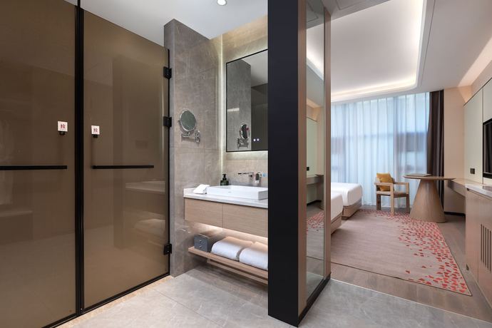 Imagen de la habitación del Hotel Ramada By Wyndham Honghe Kaiyuan. Foto 6