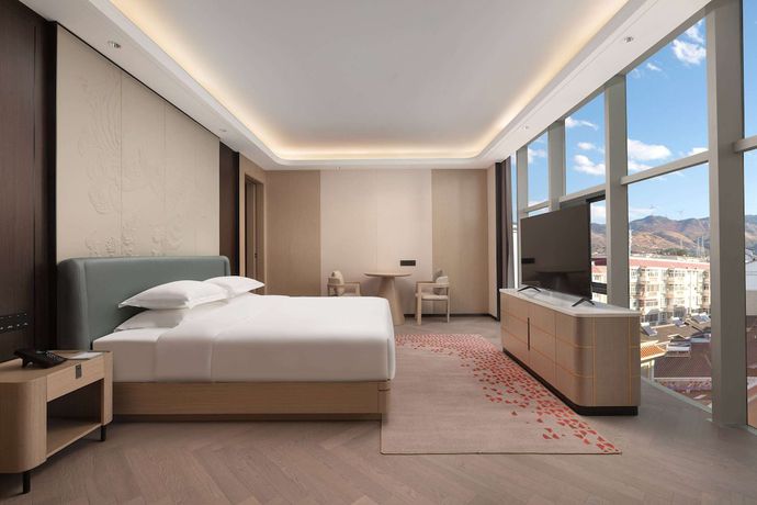Imagen de la habitación del Hotel Ramada By Wyndham Honghe Kaiyuan. Foto 9
