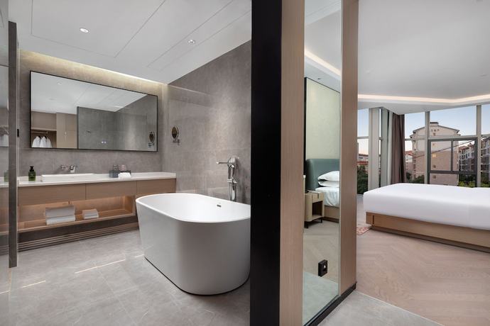 Imagen de la habitación del Hotel Ramada By Wyndham Honghe Kaiyuan. Foto 10