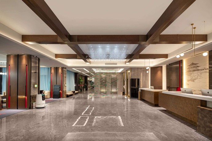 Imagen de los interiores del Hotel Ramada By Wyndham Honghe Kaiyuan. Foto 19