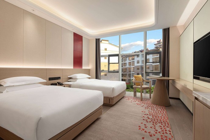 Imagen de la habitación del Hotel Ramada By Wyndham Honghe Kaiyuan. Foto 11