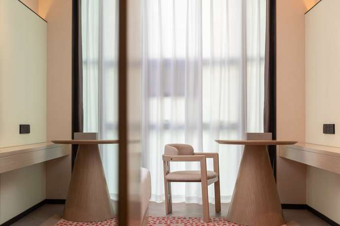 Imagen de la habitación del Hotel Ramada By Wyndham Honghe Kaiyuan. Foto 14